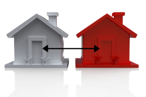 image of two small houses, one white and one red with a double sided black arrow going between them to demonstrate residential real estate investment cross collateralisation