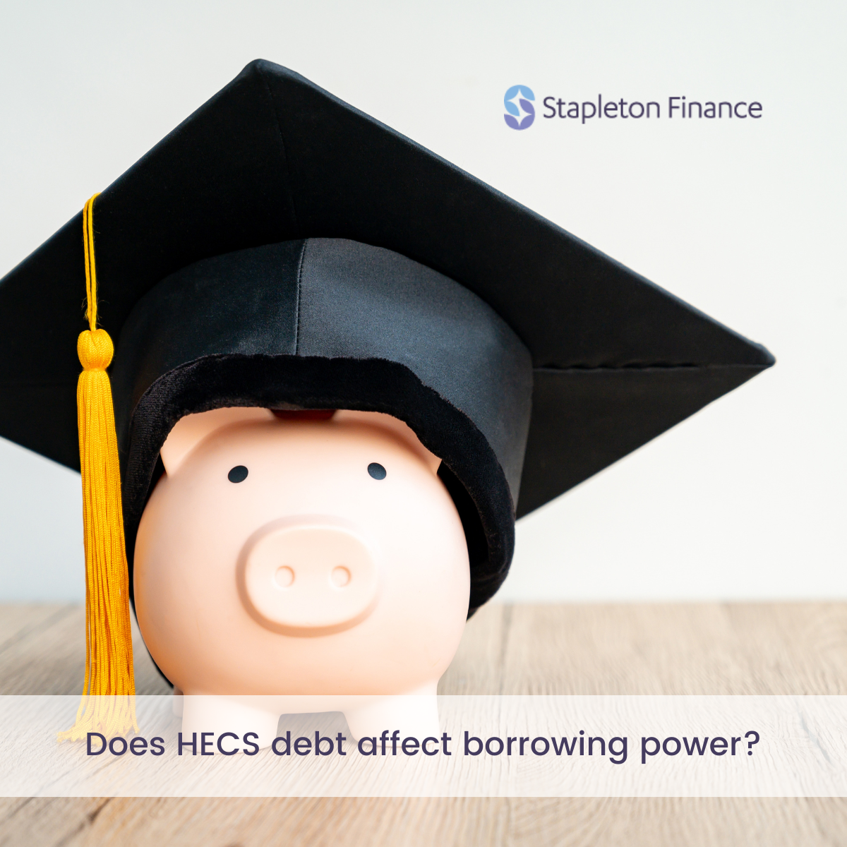 piggy bank in a graduation cap and yellow tassel with the words does hecs debt affect borrowing power