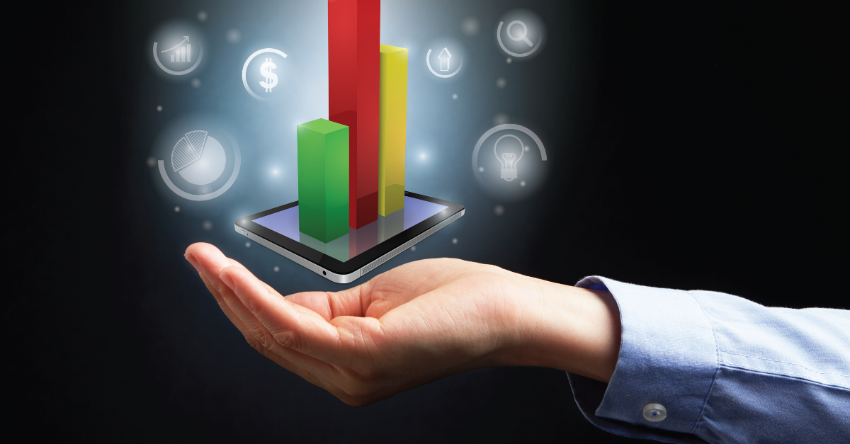 hand holding a graphic of a graph in colors with bubbles showcasing a boost